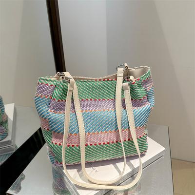 Japanische und koreanische Dopamin-kontrastierende gestreifte Schultertasche 2025 Sommerurlaub Strandmode Persönlichkeit ausländischer Stil Achsel-Tragetasche