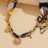 Acciaio inossidabile stampa tessuto cavo sole amore clavicola catena stile etnico autunno e inverno nicchia collana