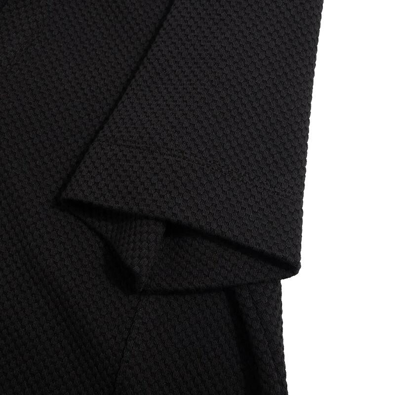 Puma Jednobarevné ležérní volné minimalistické pletené polo šaty s krátkým rukávem dámské šaty černé 676658-01