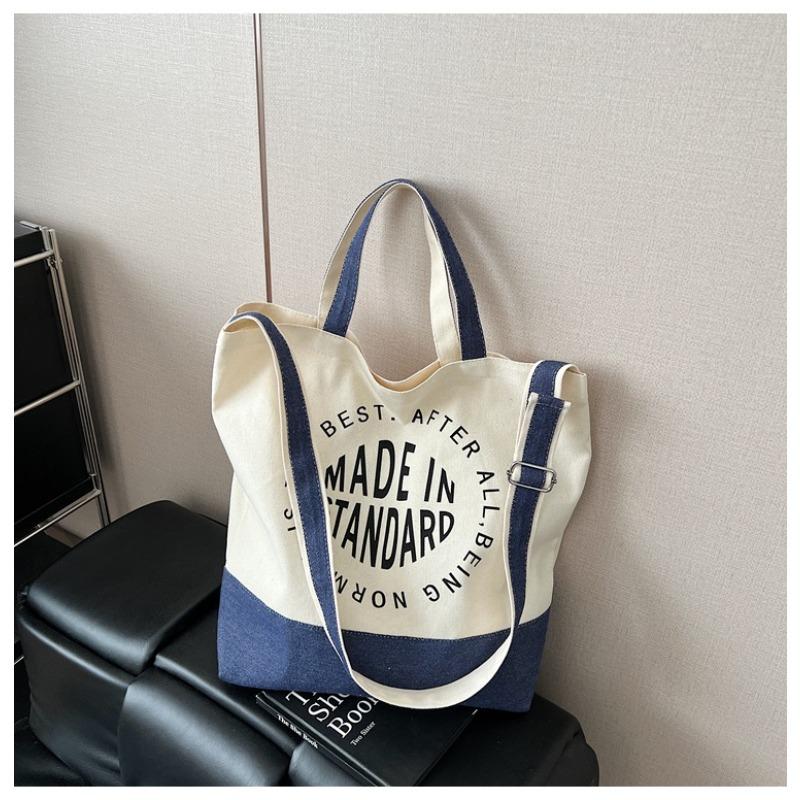 

Niche casual canvas bag women s spring and summer new students class commuting shoulder bag trendy messenger bag синий