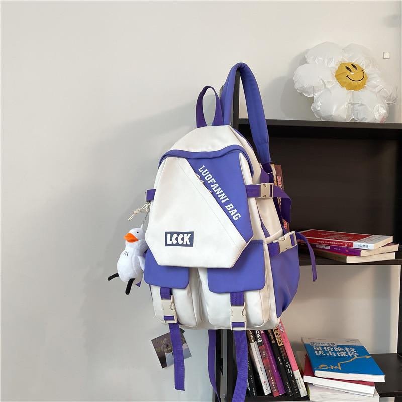 

Stylish High School Backpack For Teens With Large Capacity And Waterproof Design In Blue/black/red/purple Фіолетовий