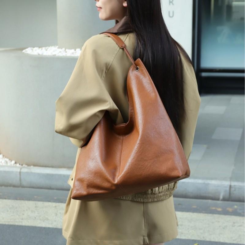 2025 Vegetable Tanned Cowhide Popular Large-capacity Tote Bag All-matching One-shoulder Class Armpit Commuter