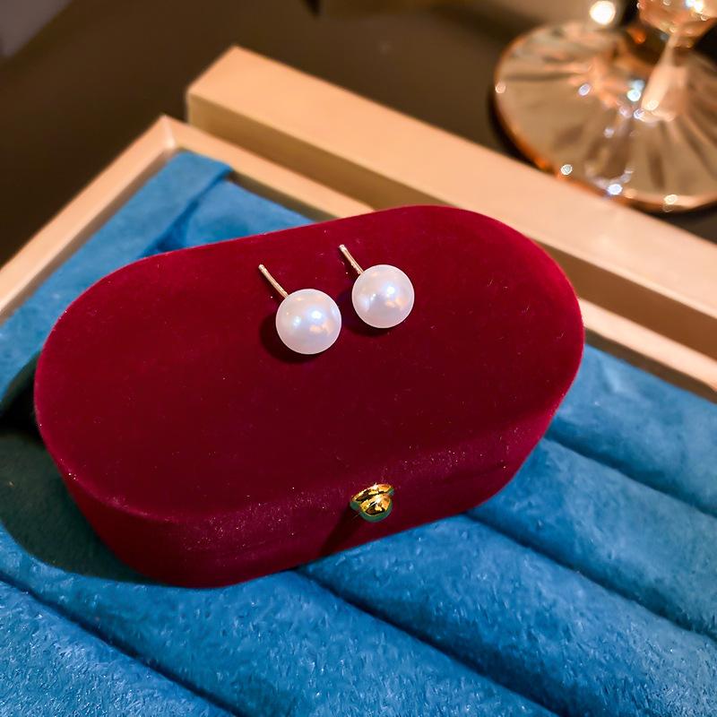Simple and versatile retro pearl earrings Korean niche design sense small stud earrings sweet earrings women