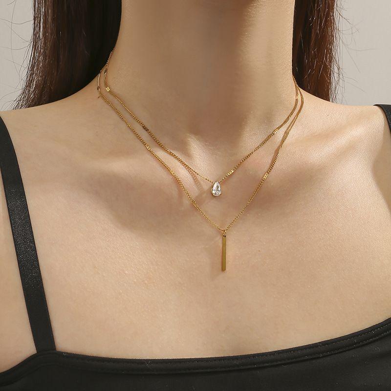 Colier cu pandantiv lung dublu strat cu strasuri în formă de picătură de apă pentru femei