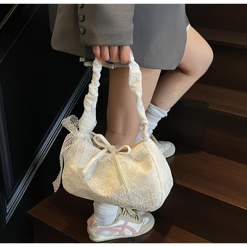 This lace armrest bag exudes a pure and alluring charm, while its sweet bow-tie design makes it perfect for women's dates, parties, and everyday