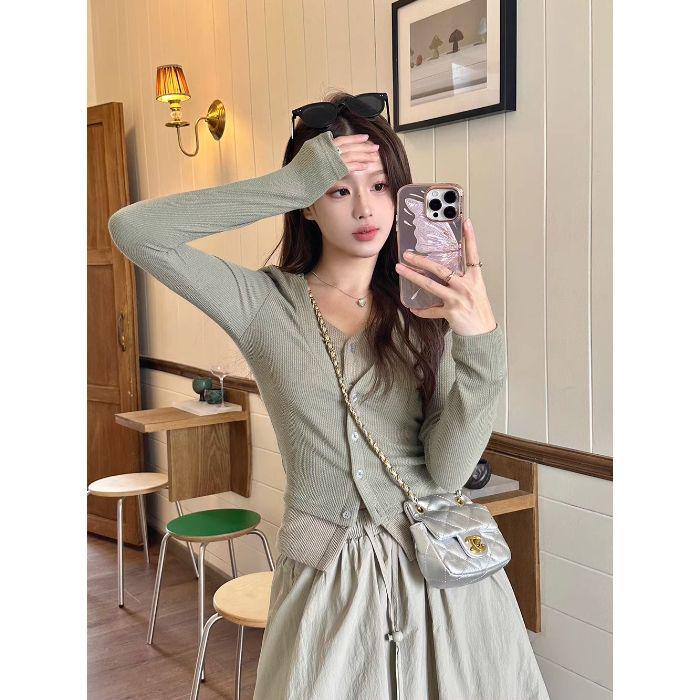 

Сладкий и острый весенний комплект-двойка: Трикотажный топ в стиле колор-блок и миди-юбка с цветочным принтом XL