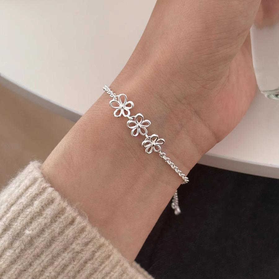 PANJBJ 925 Sterling Silver Flower Hollow Out Bracelet for Women Asymmetric Very Fine Sweet Minimalism Jewelry Gift Dropshipping