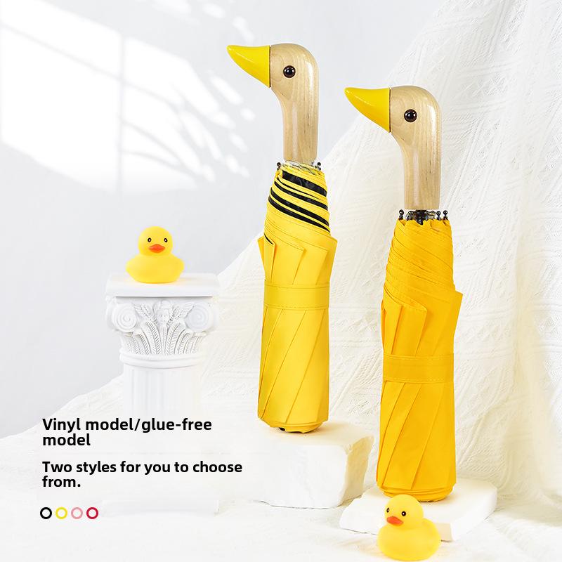 Creative Duck Head Umbrella: Stylish Black with Wooden Handle, Sun Protection, Dual-Purpose for Rain or Shine.