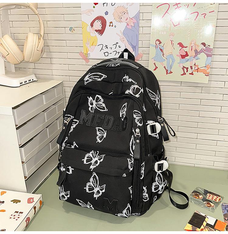 Schoolbag Soft light Cool atmosphere Milk white butterfly full print schoolbag Junior high school students Daily commute Lightweight versatile