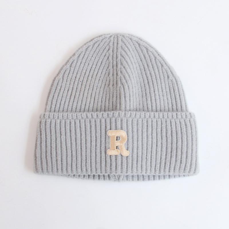 Wool hat women's autumn and winter new letter R standard knitted hat flanged ear protection warm Internet celebrity cold hat tide