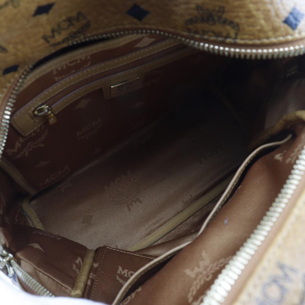 MCM Logogram Rucksack Tagesrucksack MMK2AVE20 Kleine Nieten Braun PVC Damen Gebraucht
