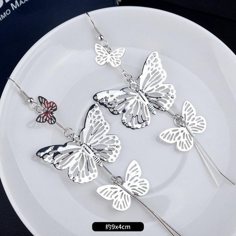 Fashion exaggerated niche temperament fringed earrings retro personality versatile sequined earrings women's long ear jewelry