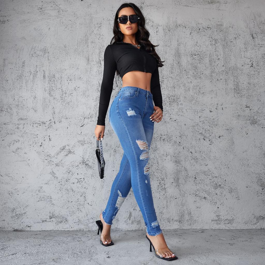 Módní dámské džíny zlomené dírky dámské jaro a léto novinka Slim lifting hip small feet kalhoty ženské