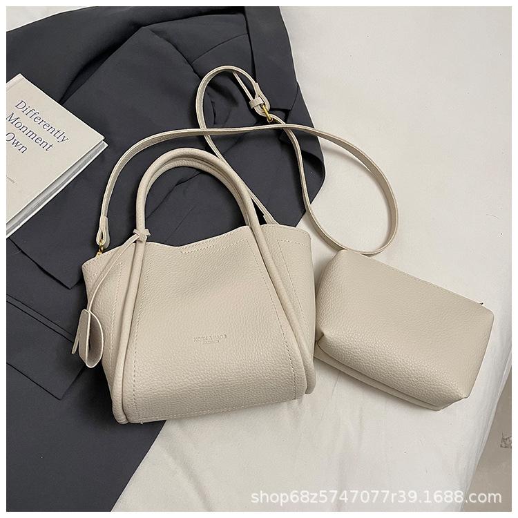 

Lychee bucket bag women s new niche texture hand-to-hand shoulder crossbody bag high-end fresh vegetable basket bag