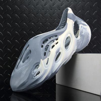 Lato nowe kamuflażowe sandały z dziurami kokosowymi rzymskie buty plażowe sandały codzienne męskie para jednoczęściowe 2025