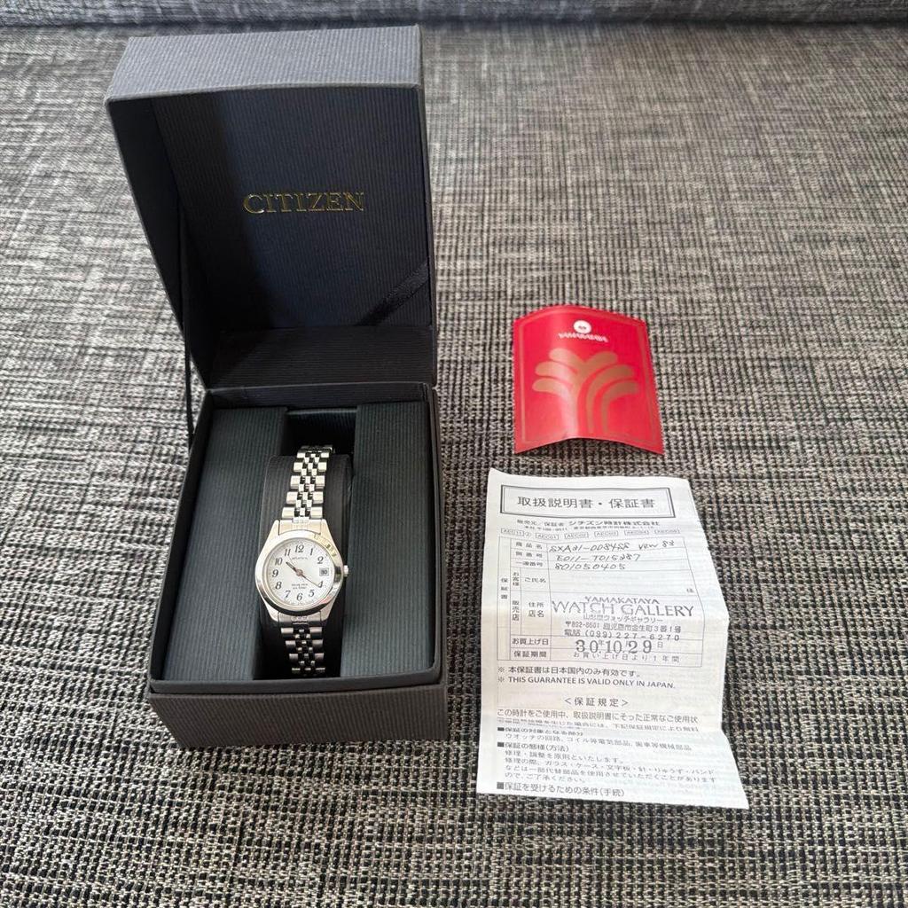 Used and unused CITIZEN sharex Solartech wristwatch silver dial