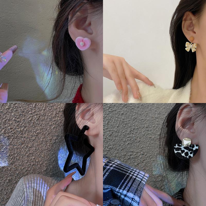 Silver needle autumn and winter hairball earrings women's high-end sense retro temperament earrings Korean niche ear jewelry