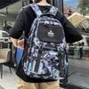Fashion new simple large-capacity backpack, junior high school student schoolbag, male trend camouflage printing trend backpack