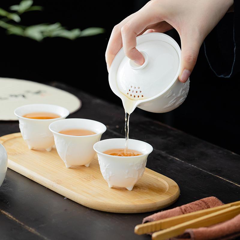 Dehua White Porcelain Mutton Fat Jade Plain Firing Relief Outdoor Travel Tea Set One Pot Three Cups of Fast Guest Cup Business Gifts
