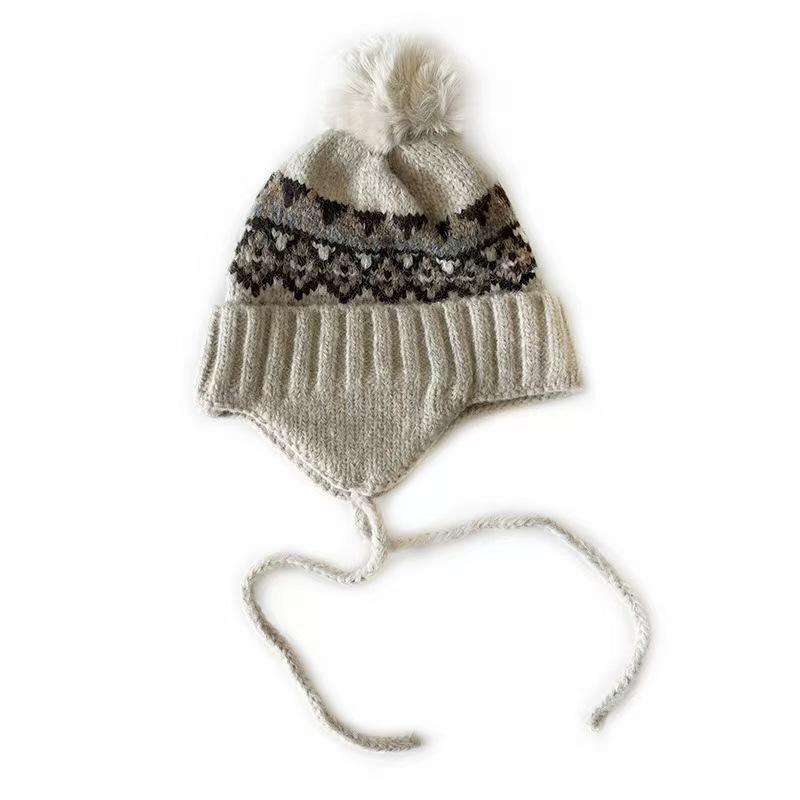 Phil knitted wool hat autumn and winter small warm ear protection foreign style Lei Feng hat hat fashion show face island women versatile