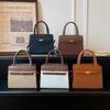 Bolsos de mujer extranjeros, elegantes y sencillos, portátiles, bandoleras cruzadas casuales de gran capacidad, versátiles, bolsos de empalme de contraste de color de alta gama