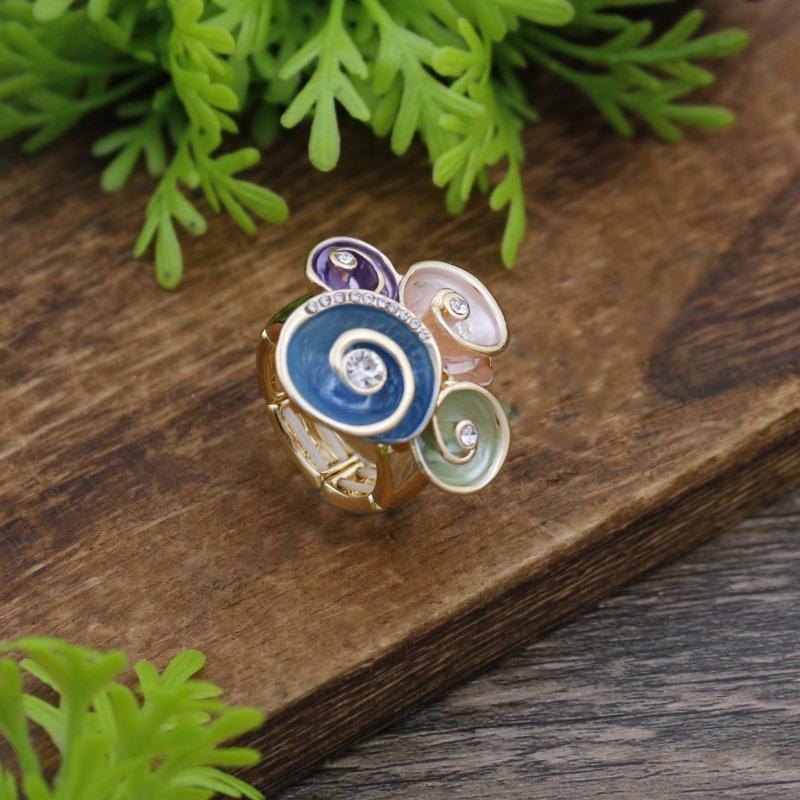 

New enamel geometric vortex flower elastic ring women s fashion high sense diamond flower ring