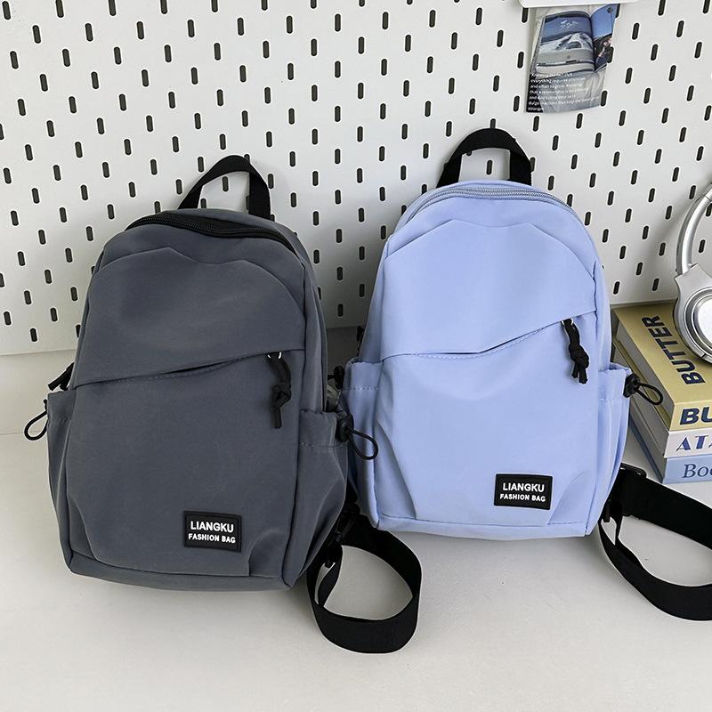 Schoolbag Korean version of simple small backpack versatile messenger bag men's casual men's sports breast bag women's large-capacity student shoulder