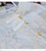 Women's Summer Asymmetrical Jacquard Cardigan with Frog Button and Crochet Design