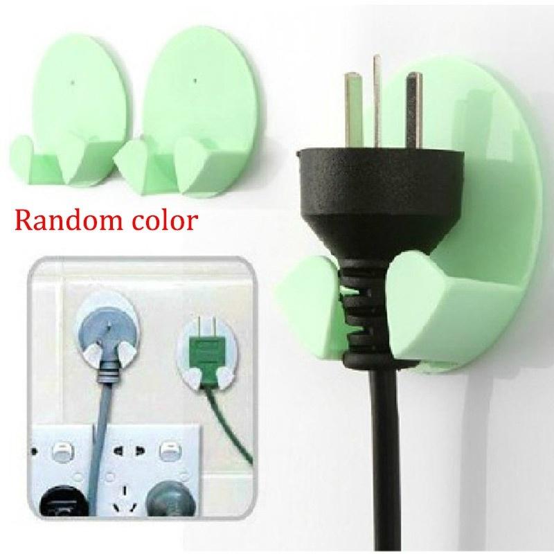 2pcs/Pack Random Color Home Office Wall Adhesive Plastic Power Plug Socket Holder Hanger Wall Storag LS