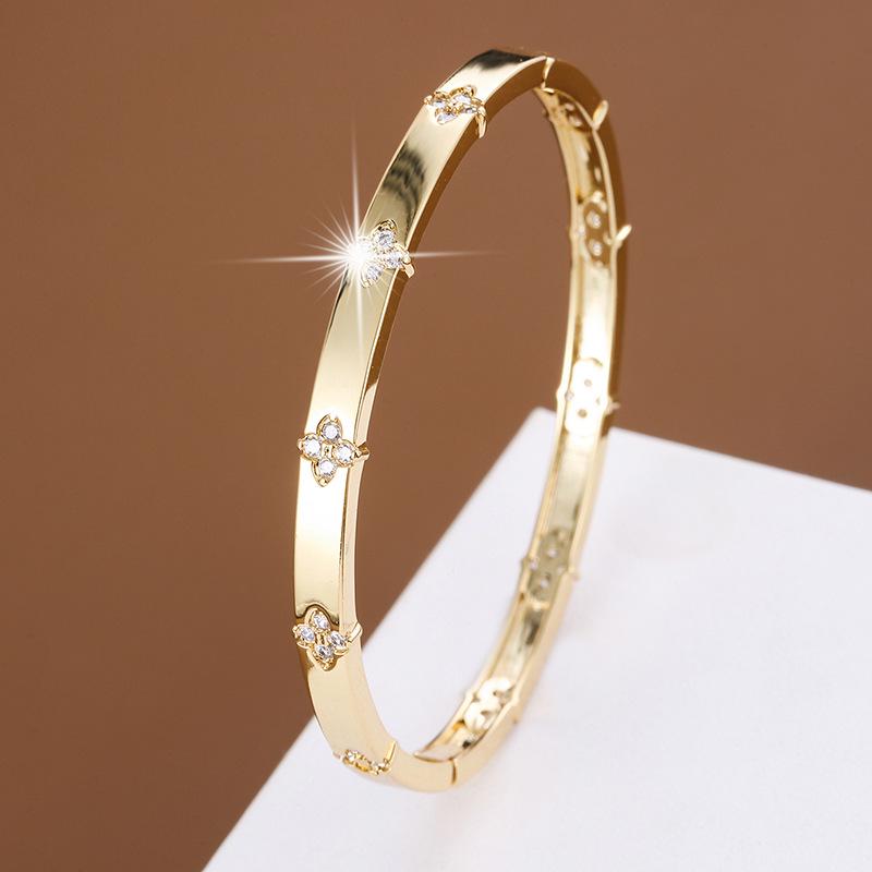Exquisite Copper Zircon Four-Petal Flower Bracelet for Women