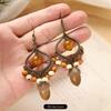 Retro niche literary earrings, natural plant fruits, wooden dried fruits, long fringed women's earrings