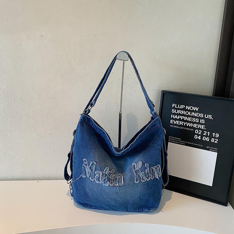 

Bag Women s 2025 New Spring Fashion Niche Design Tote Bag Large Capacity Commuter Retro Casual Shoulder Bag джинсовий синього кольору