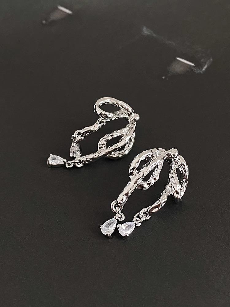 

Cold bow silver needle irregular ribbon stud earrings niche cold wind new earrings