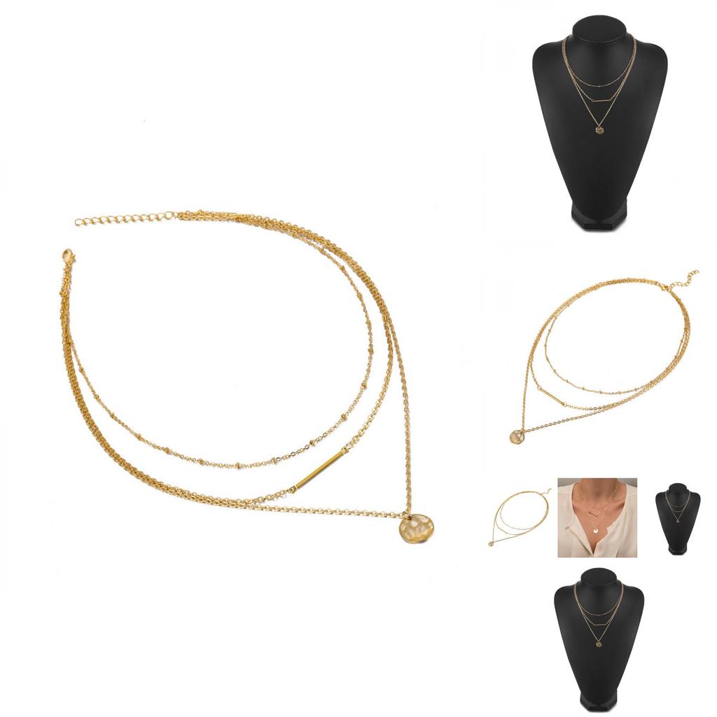 Elegant Multi-layered Gold Necklace Featuring Unique Geometric Shapes For Fashion Lovers
