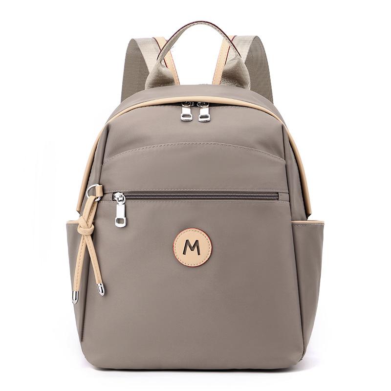 

Новый женский рюкзак из ткани Оксфорд, корейская версия, модный, легкий и простой, большой вместимости, женский рюкзак высокого класса