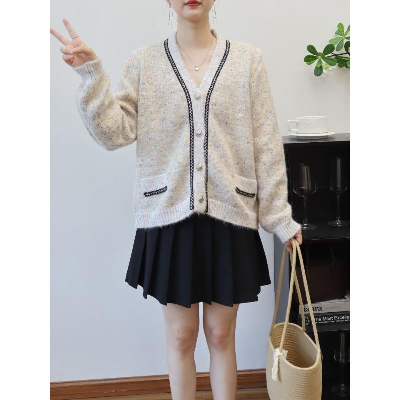 Autumn and winter new contrasting color temperament sweater jacket design sense loose knitted cardigan women