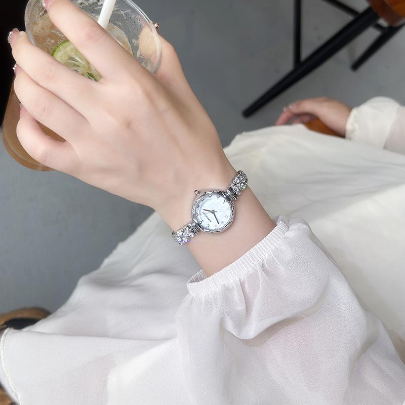 Light Luxury Diamond Cross Flower Bracelet Watch Women's Watch Niche High-end Fashion Versatile Waterproof Quartz Watch