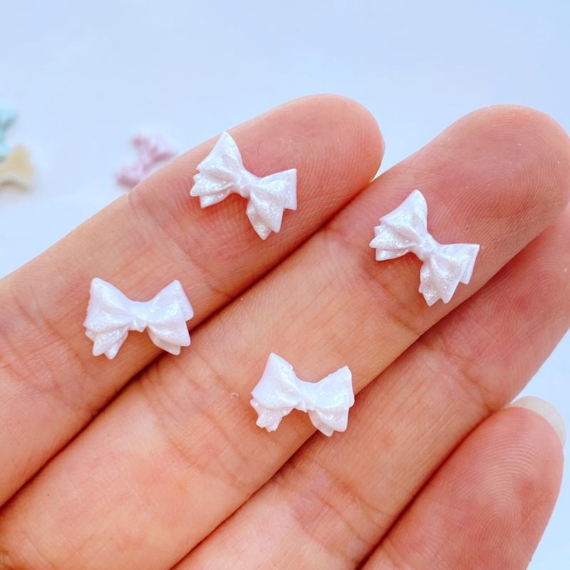 

100Pcs New Cute Mini 7*10mm Small Bowknot Series Resin Flatback Cabochon Scrapbook Kawaii Embellishments Accessories