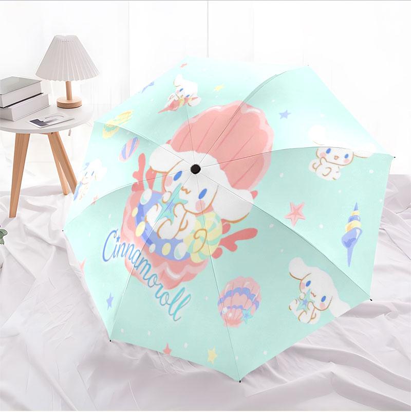 Portable travel umbrella with cute Sanrio character designs, UV-protective folding umbrella.