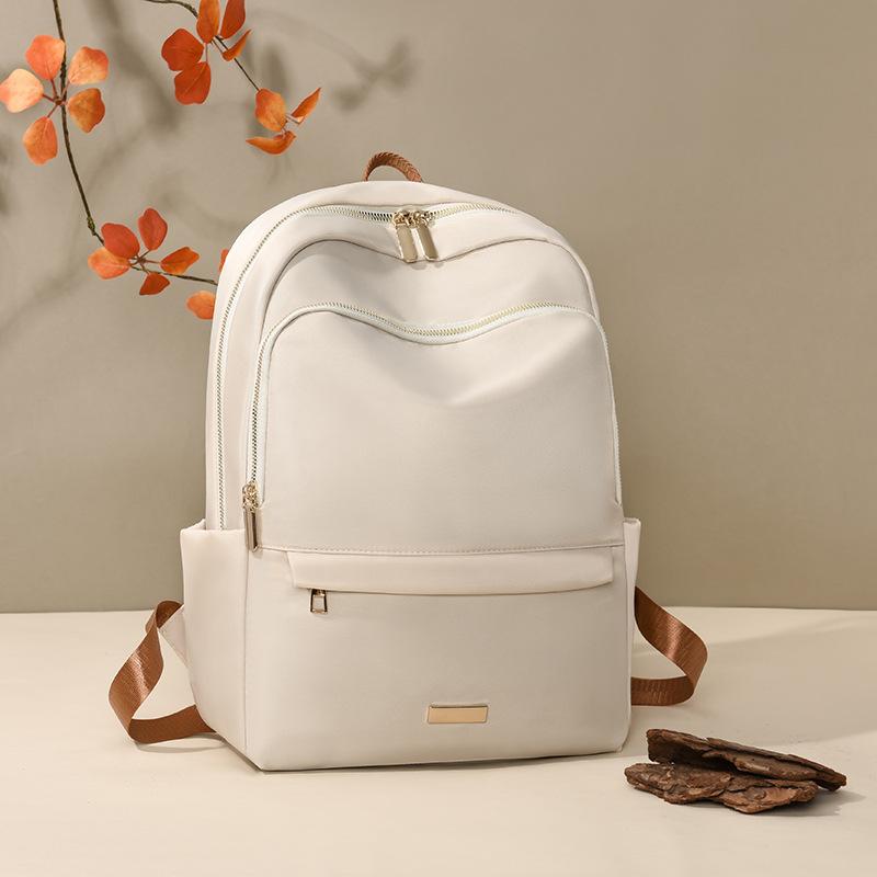 Schoolbag spring new fashion trend large capacity solid color backpack women commuting large capacity simple versatile back shoulder