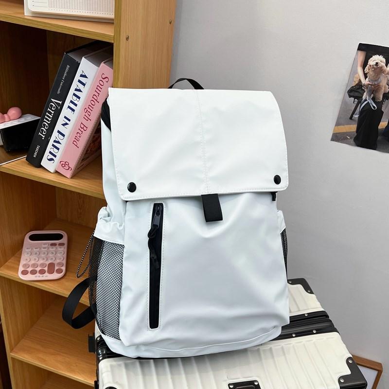 Schoolbag backpack women's new large-capacity solid color simple leisure college wind backpack trend flip student class schoolbag