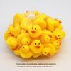Squeaky Bath Toys: Yellow Rubber Ducklings.