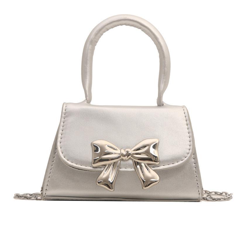 Trendy 2024 Fashion Shoulder Bag With Butterfly Knot For Women In Candy Colors Pu Material Street Style серебряный