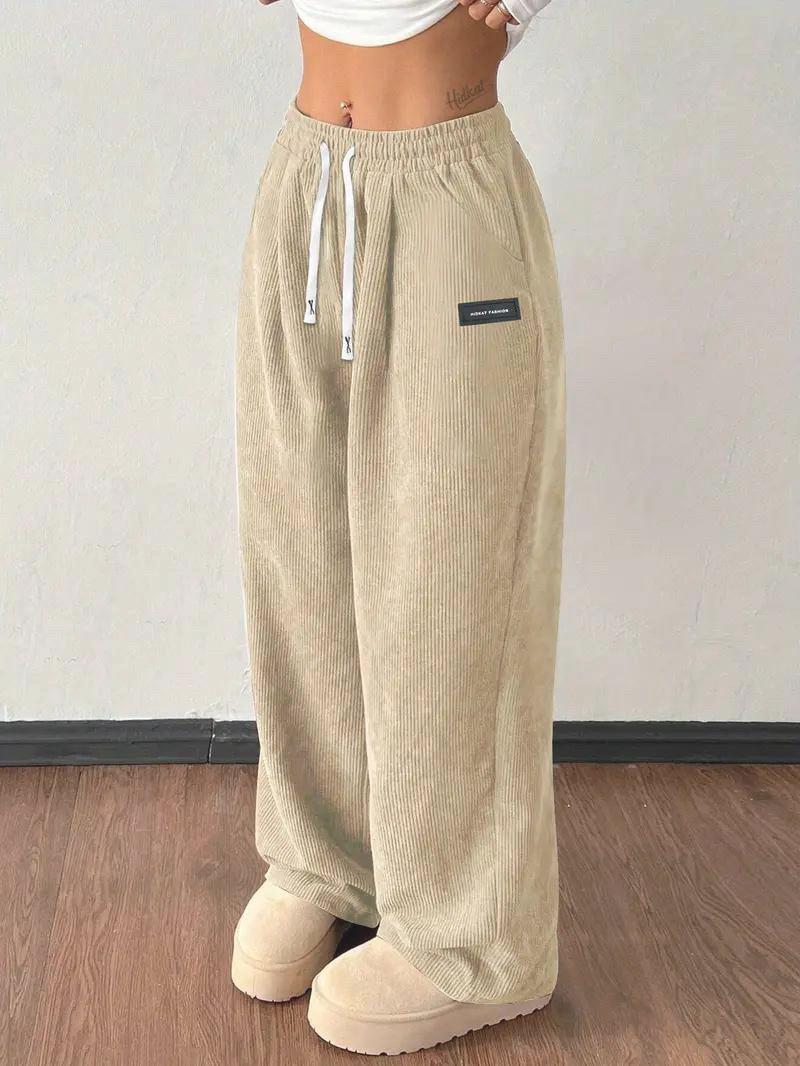 

2026 Autumn/Winter Women s Versatile Loose Solid Color Drawstring Pocket Pants S