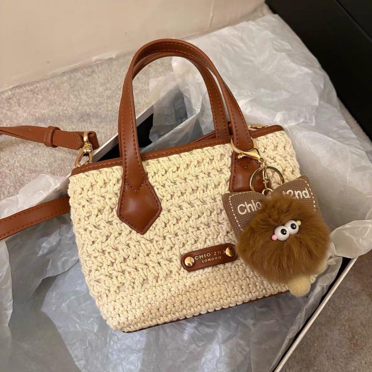 

Nanfeng s new trendy girl Qianxi brocade tote bag women s 2025 super fire handheld woven bag shoulder messenger bag