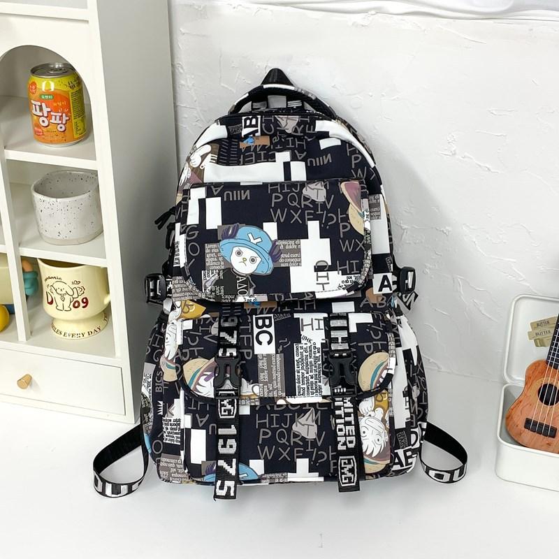 

New fashion student schoolbag animation printing trend fashion backpack men and women large capacity simple graffiti backpack
