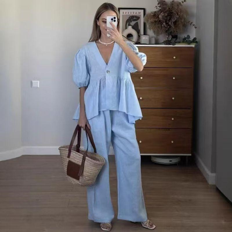 

Мода в западном стиле Свободный топ с V-образным вырезом и рукавами-буфами Комплект широких брюк Свободный комплект из топа и брюк Blue S