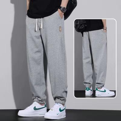 Pantaloni della tuta da uomo taglie forti abbigliamento sportivo vita elastica casual larghi nero grigio cotone joggers pantaloni larghi da uomo