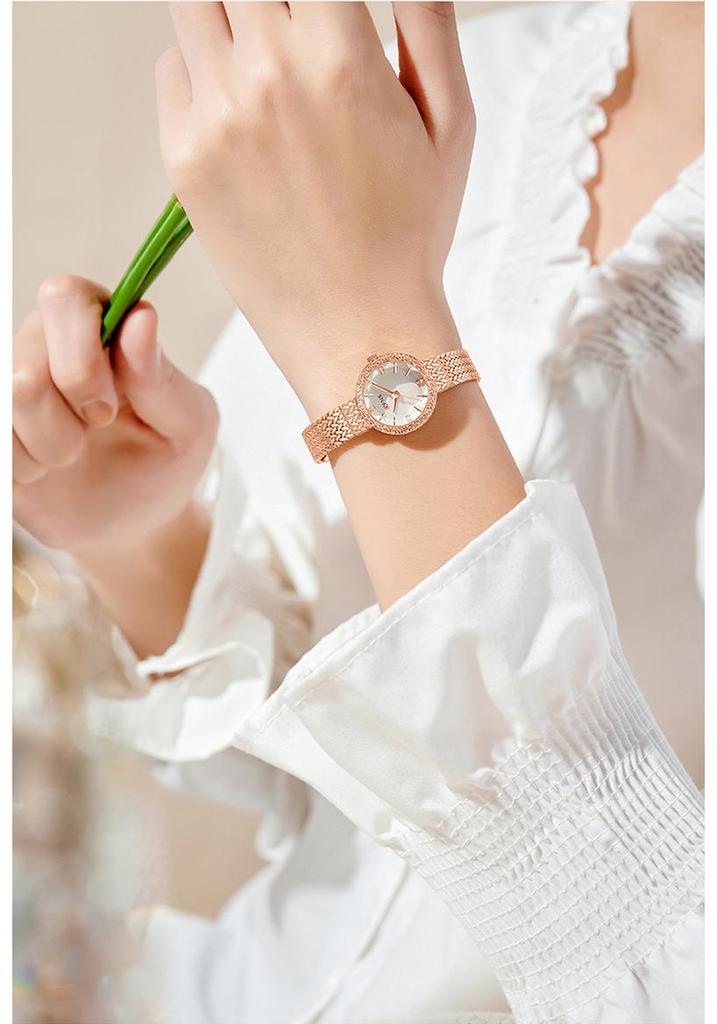 Ofns Women's Light Luxury Quartz Wristwatch - Wheat Ear Design, Round, Waterproof, Fashionable.