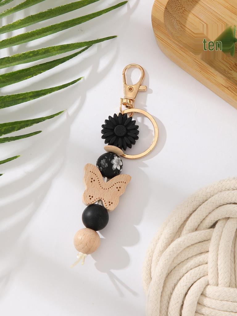 Silicone Beaded Keychain with Daisy, Wooden Butterfly Bracelet & Tassel Pendant